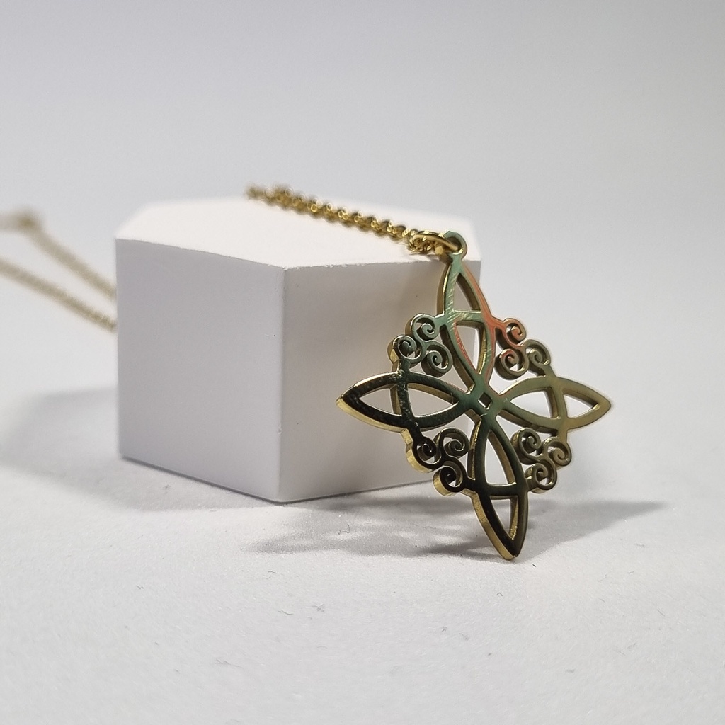 Colgante nudo de bruja dorado